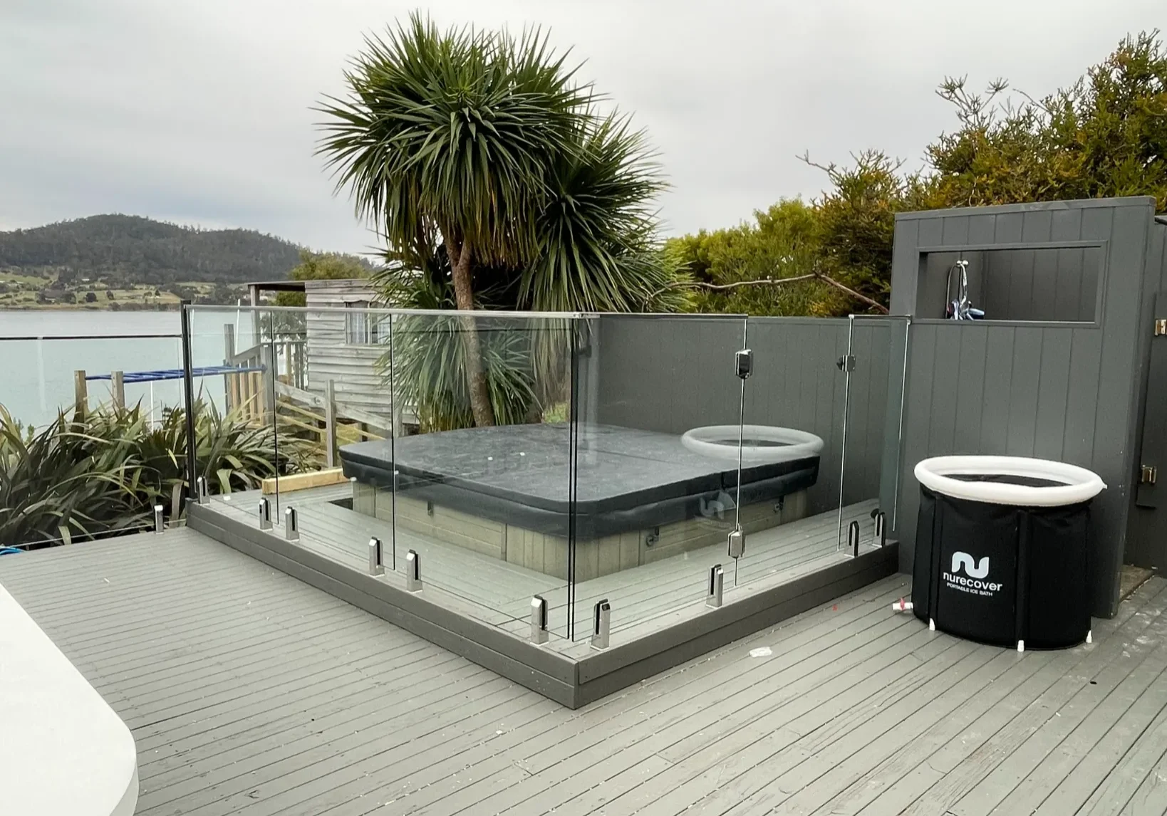 Clear glass pool fencing installed around a mini pool in Hobart TAS.