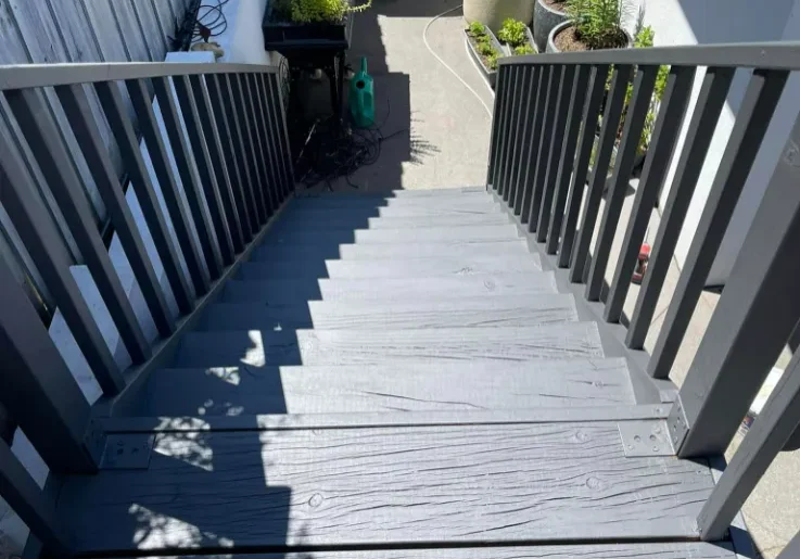 Newly painted outdoor stairs with wooden slat steps leading in Hobart TAS.